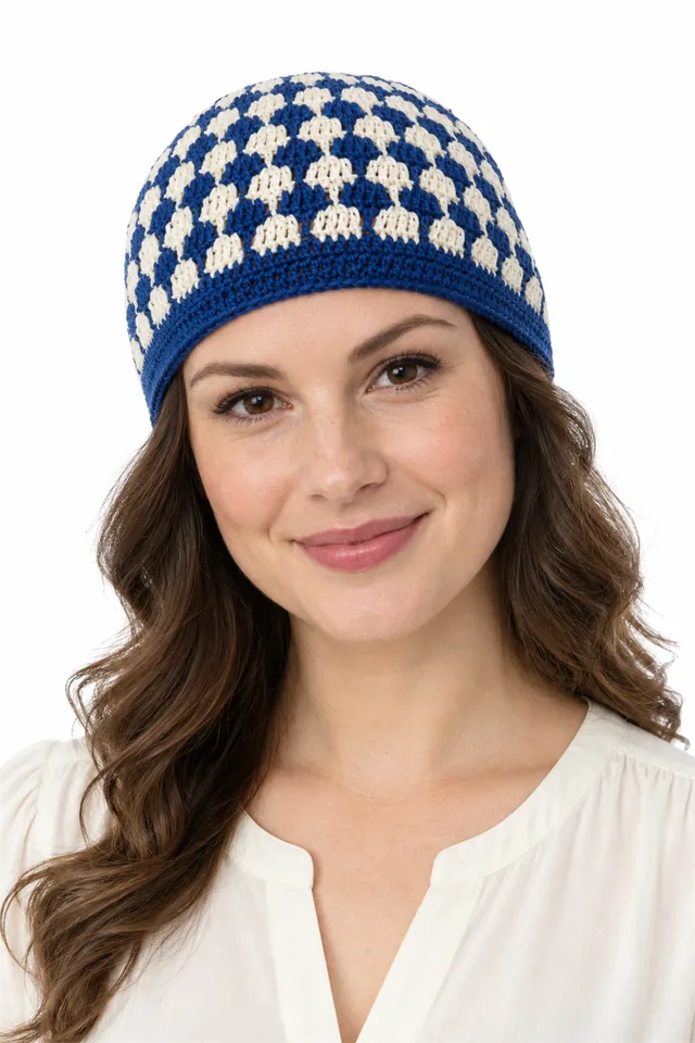 AI concept of a cobalt blue crochet skullcap with checkerboard pattern.
