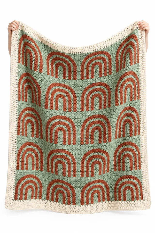AI concept of a mint green crochet throw with basket and arch tile pattern.